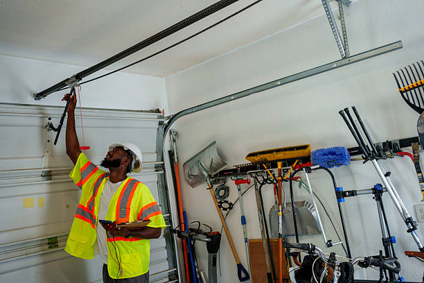 Professional Garage Door Maintenance technician working in Plainview, MN